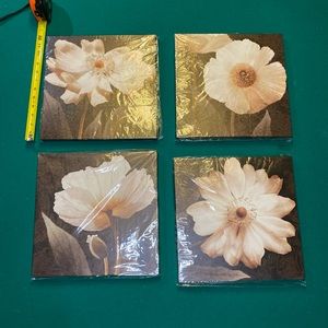 FOUR NEW IN THE PLATIC 12X12 FRAIMED WALL ART FETURING MONOCHROME FLOWERS